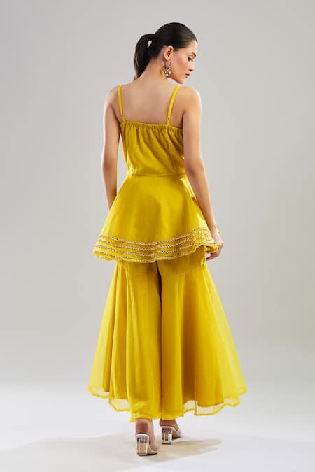 Shop_Pomcha Jaipur_Yellow Cotton Gota Patti Sweetheart Neck Embroidered Peplum Top And Sharara Set _at_Aza_Fashions
