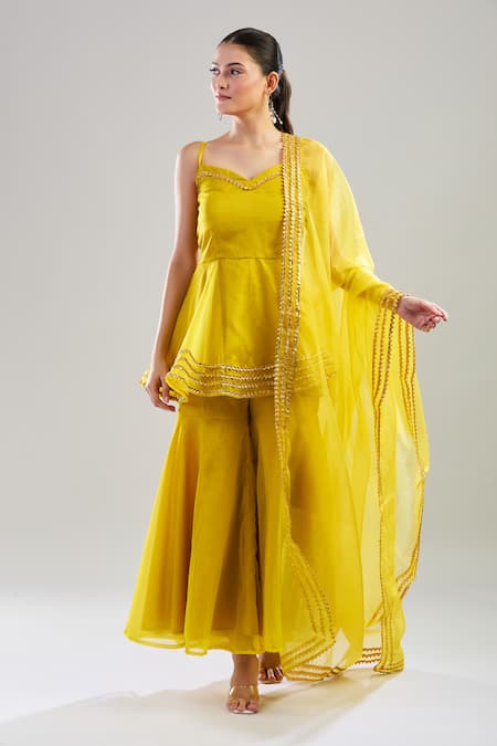 Shop_Pomcha Jaipur_Yellow Cotton Gota Patti Sweetheart Neck Embroidered Peplum Top And Sharara Set _Online_at_Aza_Fashions