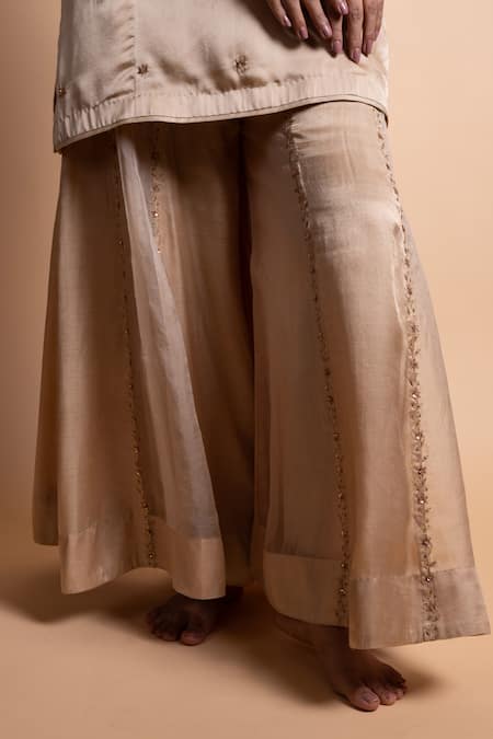 Rhua_Beige Silk, Cotton Beads, Embroidery V-neck Gold Handcrafted Sharara Suit Set _at_Aza_Fashions