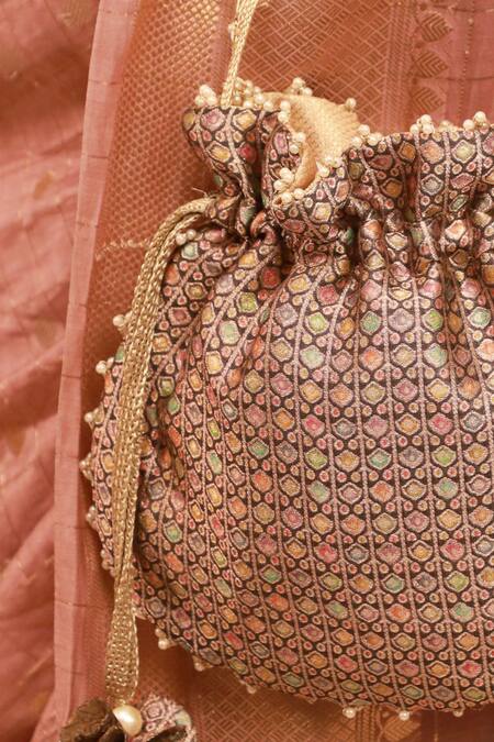 Buy Amyra Multi Color Tassels, Beads Onyx Potli With Intricate Online at Aza Fashions Buy_Amyra_Multi Color Tassels, Beads Onyx Potli With Intricate_Online_at_Aza_Fashions