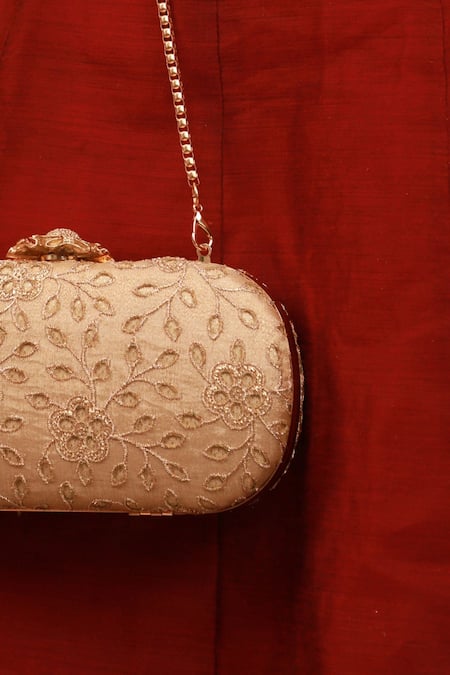 Buy_Amyra_Gold Embroidery Cutwork Capsule Clutch _Online_at_Aza_Fashions