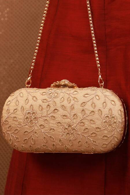 Shop_Amyra_Gold Embroidery Cutwork Capsule Clutch _Online_at_Aza_Fashions