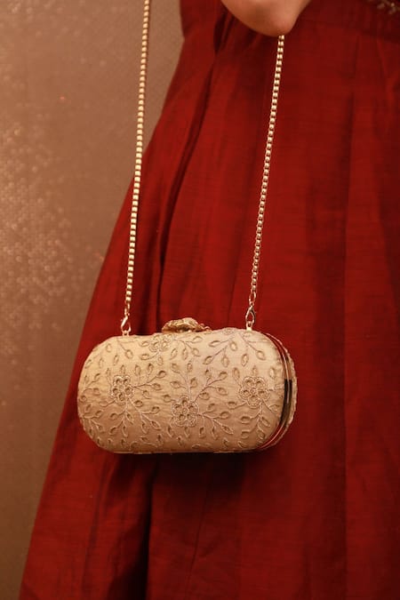 Amyra_Gold Embroidery Cutwork Capsule Clutch _at_Aza_Fashions
