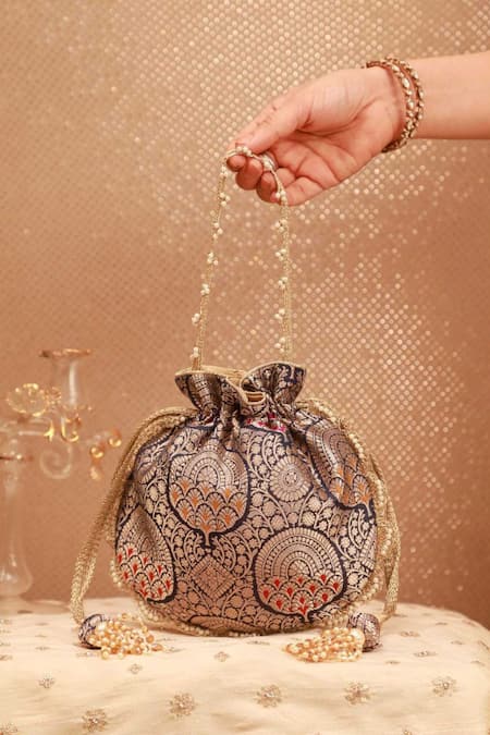 Amyra_Navy Embroidery, Tassels Banarasi Silk Potli Bag _Online_at_Aza_Fashions