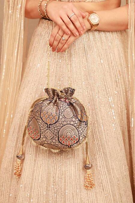 Shop_Amyra_Navy Embroidery, Tassels Banarasi Silk Potli Bag _Online_at_Aza_Fashions