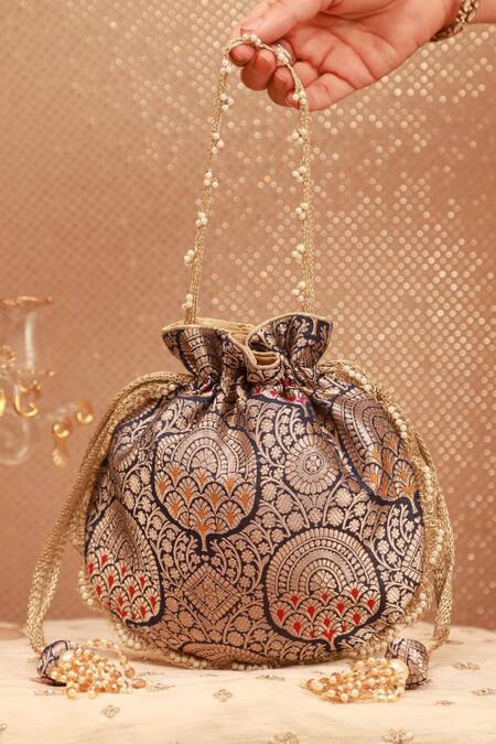 Amyra_Navy Embroidery, Tassels Banarasi Silk Potli Bag _at_Aza_Fashions