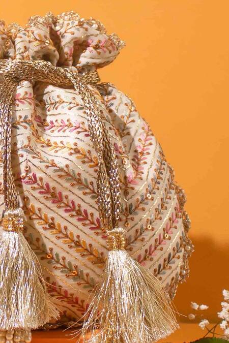 Amyra_Off White Embroidery, Tassels Potli Bag _Online_at_Aza_Fashions
