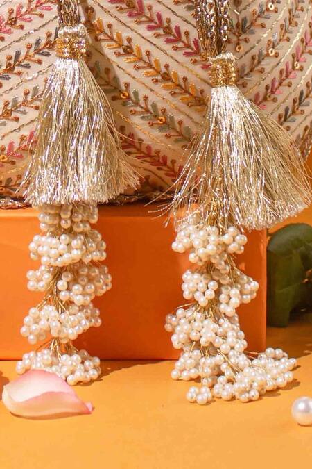Buy_Amyra_Off White Embroidery, Tassels Potli Bag _Online_at_Aza_Fashions
