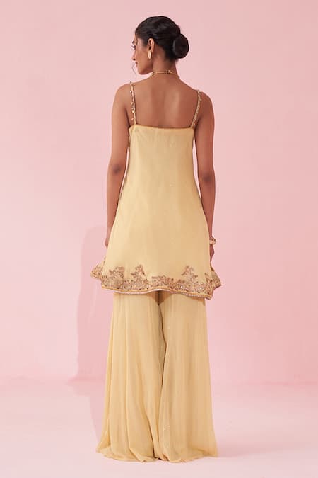 Shop_Studio Bagechaa_Yellow Georgette Embroidery Round Neck Genda Sharara Set _at_Aza_Fashions