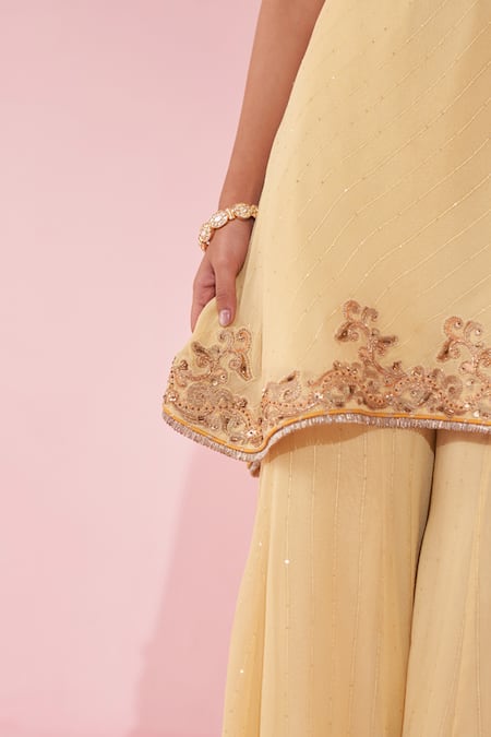 Buy_Studio Bagechaa_Yellow Georgette Embroidery Round Neck Genda Sharara Set _Online_at_Aza_Fashions