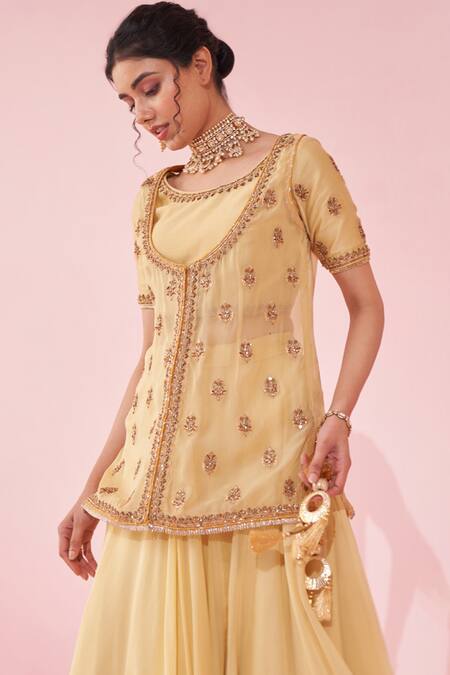 Studio Bagechaa_Yellow Chanderi, Organza Embroidery, Tassels Round Neck Lehenga Set _at_Aza_Fashions