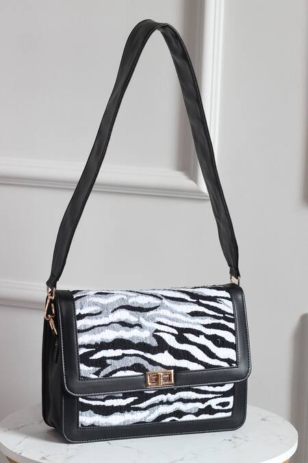 Boxwish By Bhumika Black Jacquard Abstract Pattern Sling Bag at Aza Fashions Boxwish By Bhumika_Black Jacquard Abstract Pattern Sling Bag _at_Aza_Fashions