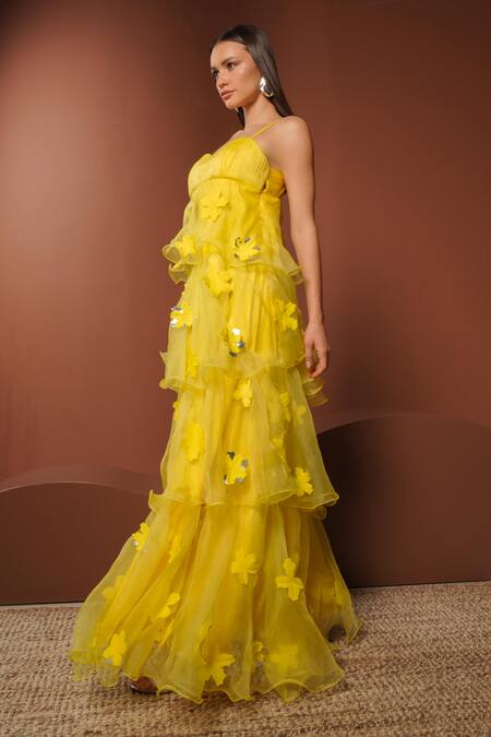 Vidhi Wadhwani_Yellow Organza Fabric Flowers Open Neck Tiered Ruffle Maxi Dress _Online_at_Aza_Fashions