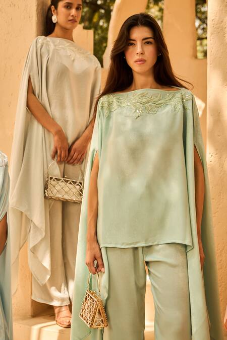 Tasuvure Indes Blue Satin Sequins Embroidered Cape And Pant Set at Aza Fashions Tasuvure Indes_Blue Satin Sequins Embroidered Cape And Pant Set_at_Aza_Fashions