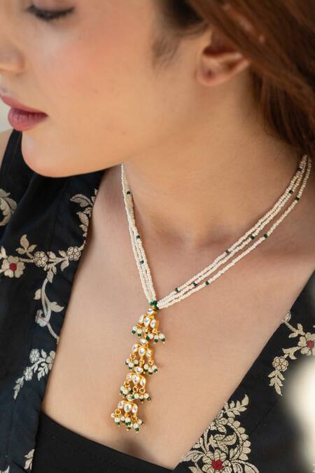 Buy Do Taara Gold Plated Kundan And Pearl Long Necklace Online at Aza Fashions Buy_Do Taara_Gold Plated Kundan And Pearl Long Necklace _Online_at_Aza_Fashions