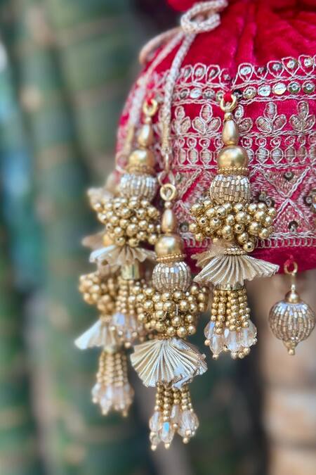 Bhavna Kumar Red Tassels, Beads Velvet Potli With Gold Online at Aza Fashions Bhavna Kumar_Red Tassels, Beads Velvet Potli With Gold_Online_at_Aza_Fashions