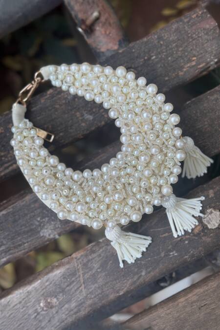 Shop Bhavna Kumar White Pearls, Tassels Embellished Moon Mini Bag at Aza Fashions Shop_Bhavna Kumar_White Pearls, Tassels Embellished Moon Mini Bag_at_Aza_Fashions