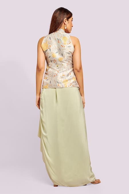 Shop Blue Lotus Design Ivory Embroidery Halter Neck Printed Top And Drape Skirt at Aza Fashions Shop_Blue Lotus Design_Ivory Embroidery Halter Neck Printed Top And Drape Skirt _at_Aza_Fashions