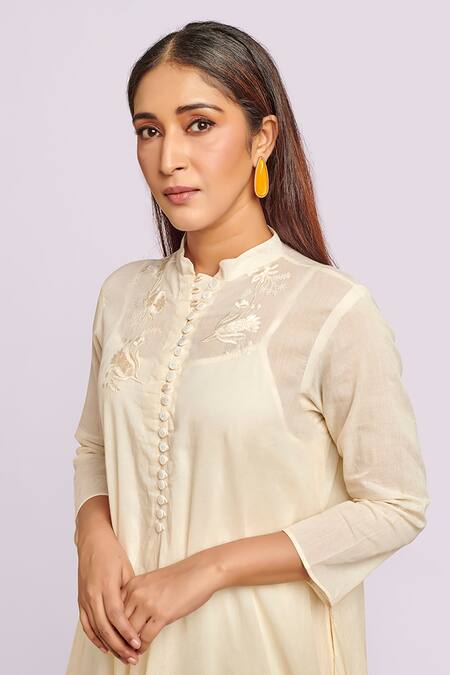 Shop Blue Lotus Design Ivory Cotton Embroidery Round Neck Drape Midi Dress Online at Aza Fashions Shop_Blue Lotus Design_Ivory Cotton Embroidery Round Neck Drape Midi Dress _Online_at_Aza_Fashions