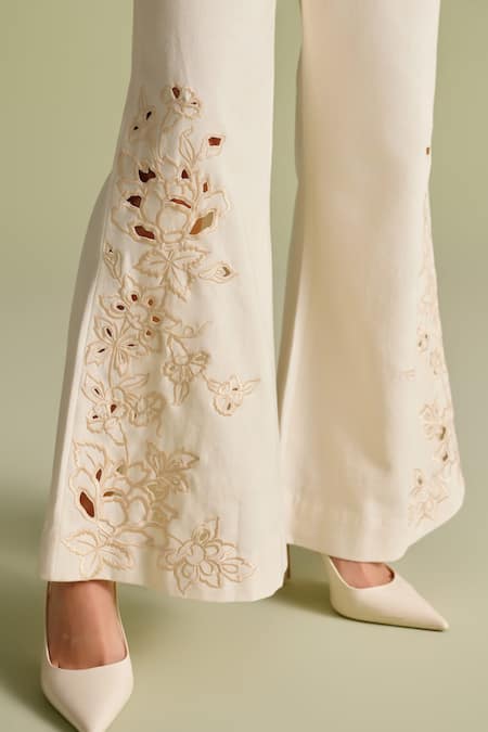 Buy Chandrima Ivory Cut Work Flared Palazzo Pants Online at Aza Fashions Buy_Chandrima_Ivory Cut Work Flared Palazzo Pants _Online_at_Aza_Fashions