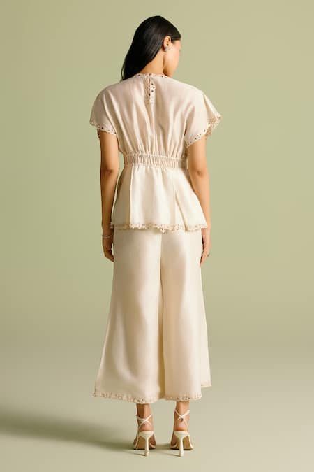 Shop Chandrima Ivory Cotton Embroidery Round Neck Pleated Corset Top With Floral at Aza Fashions Shop_Chandrima_Ivory Cotton Embroidery Round Neck Pleated Corset Top With Floral _at_Aza_Fashions