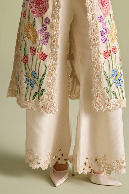 Chandrima Ivory Chanderi Cutwork Bell Bottom Palazzos Online at Aza Fashions Chandrima_Ivory Chanderi Cutwork Bell Bottom Palazzos _Online_at_Aza_Fashions