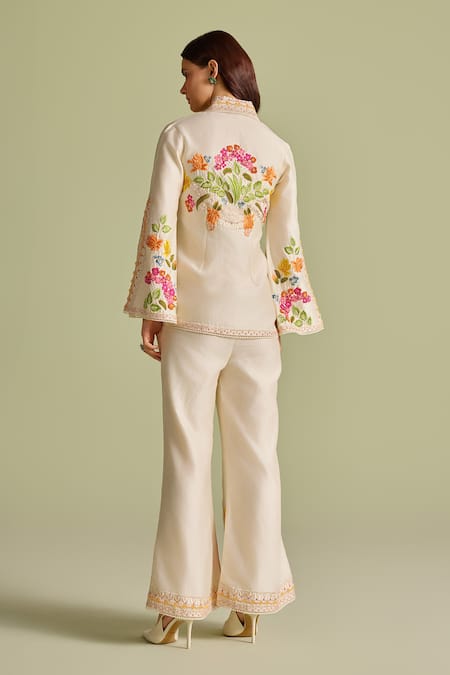 Shop Chandrima Ivory Cotton Embroidery Floral Threadwork Bell Bottom Pants at Aza Fashions Shop_Chandrima_Ivory Cotton Embroidery Floral Threadwork Bell Bottom Pants _at_Aza_Fashions