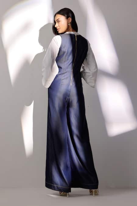 Shop Label Deepika Nagpal Blue Denim V-, Round Sleeveless Jumpsuit at Aza Fashions Shop_Label Deepika Nagpal_Blue Denim V-, Round Sleeveless Jumpsuit _at_Aza_Fashions