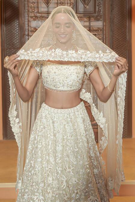 Shop Maisolos Ivory Net Embroidery, Sequins Square Neck Heavy Lehenga Set Online at Aza Fashions Shop_Maisolos_Ivory Net Embroidery, Sequins Square Neck Heavy Lehenga Set _Online_at_Aza_Fashions