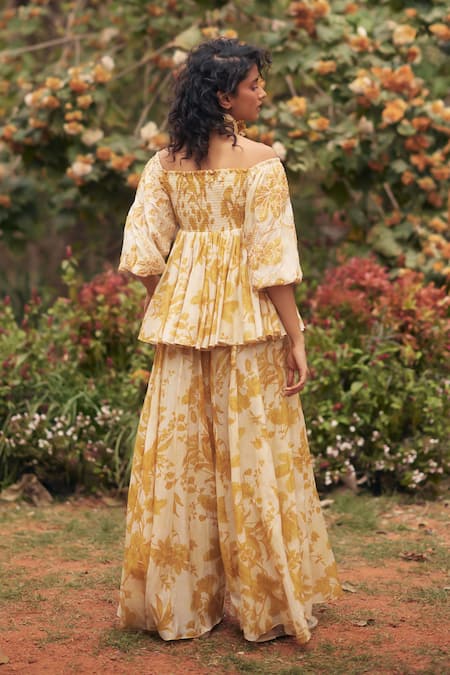 Shop_Paulmi And Harsh_Gold Chanderi, Cotton Embroidery Off-shoulder Yellow Peplum Kurta Set With Scarf _at_Aza_Fashions