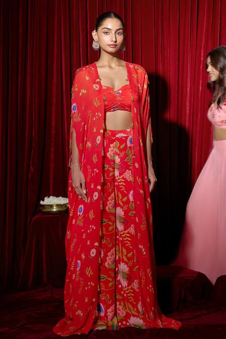 Shop Brinda Sneha Red Chiffon, Crepe Crystals Sweetheart Neck Floral Cape Set With Printed Pants Online at Aza Fashions Shop_Brinda Sneha_Red Chiffon, Crepe Crystals Sweetheart Neck Floral Cape Set With Printed Pants _Online_at_Aza_Fashions