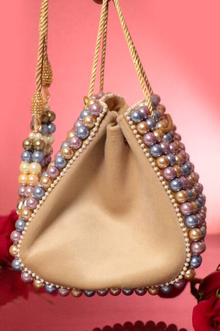 Shop_Forever Noor_Beige Beads, Pearls Suede Beaded Drawstring Handbag _Online_at_Aza_Fashions