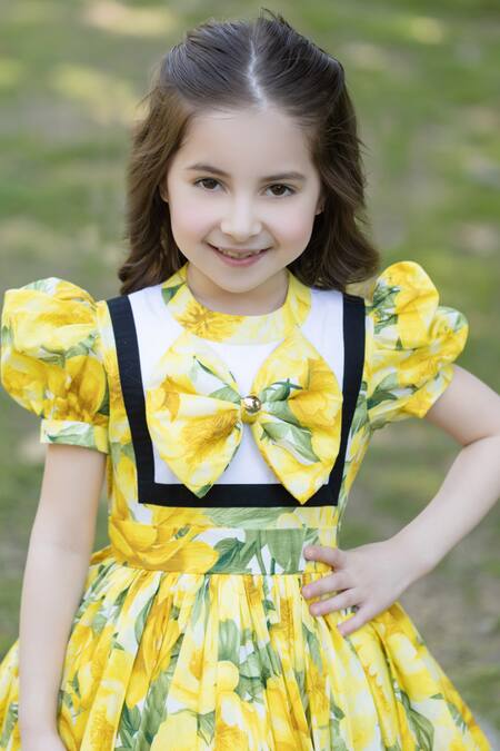Shop The Pony & Peony Co. Yellow Cotton Bows Floral Peony Dress Online at Aza Fashions Shop_The Pony & Peony Co._Yellow Cotton Bows Floral Peony Dress _Online_at_Aza_Fashions