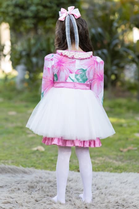 Shop The Pony & Peony Co. Pink Cotton Bows Floral Print Dress at Aza Fashions Shop_The Pony & Peony Co._Pink Cotton Bows Floral Print Dress _at_Aza_Fashions