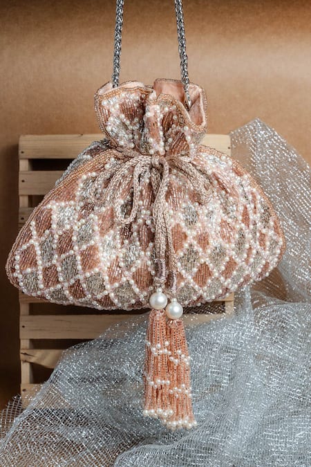 Shop Nayaab By Sonia Pink Pearls Cruzado Silver Blush Potli Bag at Aza Fashions Shop_Nayaab By Sonia_Pink Pearls Cruzado Silver Blush Potli Bag _at_Aza_Fashions