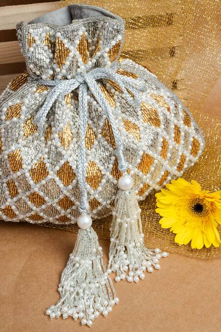 Nayaab By Sonia Gold Pearls, Tassels Cruzado Silver Aurum Potli Bag Online at Aza Fashions Nayaab By Sonia_Gold Pearls, Tassels Cruzado Silver Aurum Potli Bag _Online_at_Aza_Fashions