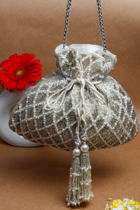 Shop Nayaab By Sonia Silver Pearls, Tassels Cruzado White Velvet Potli Bag at Aza Fashions Shop_Nayaab By Sonia_Silver Pearls, Tassels Cruzado White Velvet Potli Bag _at_Aza_Fashions