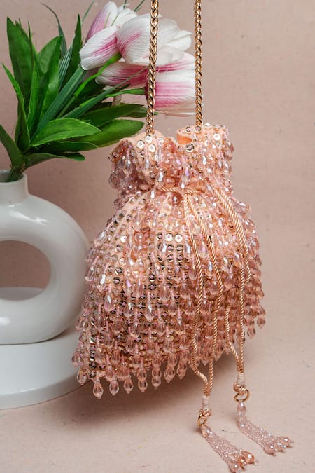 Shop Nayaab By Sonia Pink Sequins, Beads Crystalline Blush Potli Bag at Aza Fashions Shop_Nayaab By Sonia_Pink Sequins, Beads Crystalline Blush Potli Bag _at_Aza_Fashions