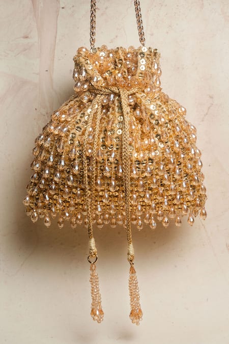 Shop Nayaab By Sonia Gold Sequins, Beads Crystalline Potli Bag at Aza Fashions Shop_Nayaab By Sonia_Gold Sequins, Beads Crystalline Potli Bag _at_Aza_Fashions