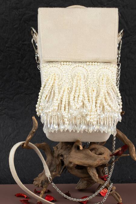 Nayaab By Sonia Ivory Pearls, Crystals Tassel Potli Clutch Online at Aza Fashions Nayaab By Sonia_Ivory Pearls, Crystals Tassel Potli Clutch_Online_at_Aza_Fashions