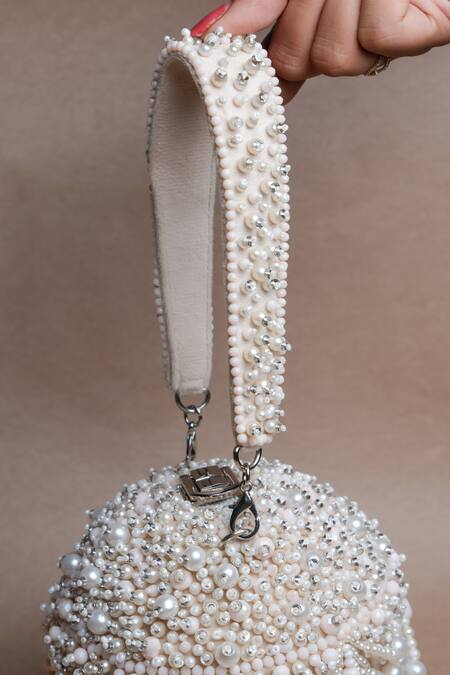 Nayaab By Sonia Off White Pearls, Tassels Oyster Overload Embellished Potli Online at Aza Fashions Nayaab By Sonia_Off White Pearls, Tassels Oyster Overload Embellished Potli _Online_at_Aza_Fashions