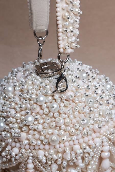 Shop Nayaab By Sonia Off White Pearls, Tassels Oyster Overload Embellished Potli Online at Aza Fashions Shop_Nayaab By Sonia_Off White Pearls, Tassels Oyster Overload Embellished Potli _Online_at_Aza_Fashions