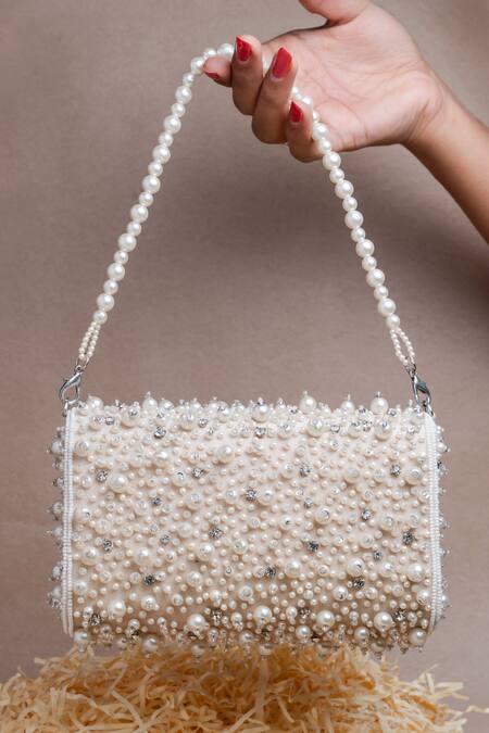 Buy Nayaab By Sonia Ivory Pearls, Diamonds Cluster Clutch Online at Aza Fashions Buy_Nayaab By Sonia_Ivory Pearls, Diamonds Cluster Clutch _Online_at_Aza_Fashions