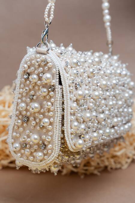 Shop Nayaab By Sonia Ivory Pearls, Diamonds Cluster Clutch Online at Aza Fashions Shop_Nayaab By Sonia_Ivory Pearls, Diamonds Cluster Clutch _Online_at_Aza_Fashions