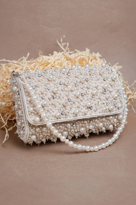 Nayaab By Sonia Ivory Pearls, Diamonds Cluster Clutch at Aza Fashions Nayaab By Sonia_Ivory Pearls, Diamonds Cluster Clutch _at_Aza_Fashions