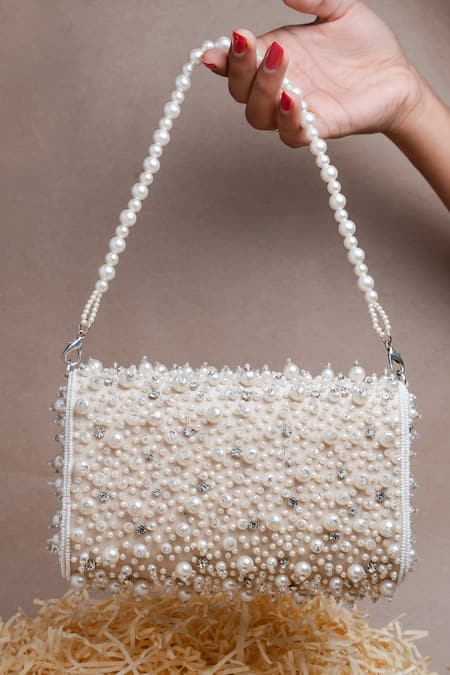 Shop Nayaab By Sonia Ivory Pearls, Diamonds Cluster Clutch at Aza Fashions Shop_Nayaab By Sonia_Ivory Pearls, Diamonds Cluster Clutch _at_Aza_Fashions