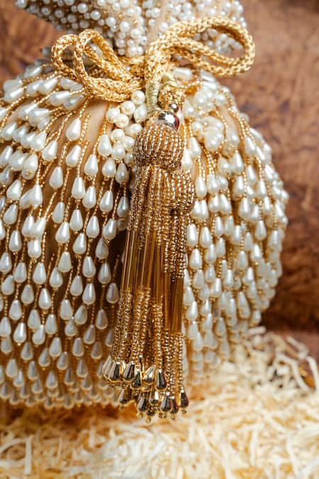 Buy Nayaab By Sonia Gold Pearls, Beads Tassel Potli Bag Online at Aza Fashions Buy_Nayaab By Sonia_Gold Pearls, Beads Tassel Potli Bag _Online_at_Aza_Fashions