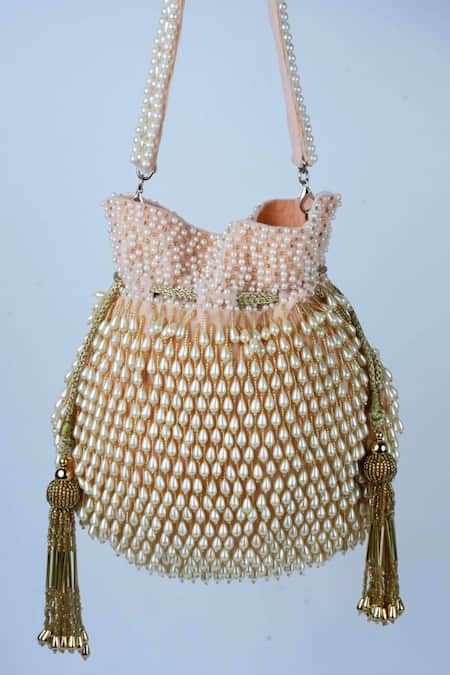 Shop Nayaab By Sonia Pink Pearls, Beads Tassel Blush Potli Bag at Aza Fashions Shop_Nayaab By Sonia_Pink Pearls, Beads Tassel Blush Potli Bag _at_Aza_Fashions
