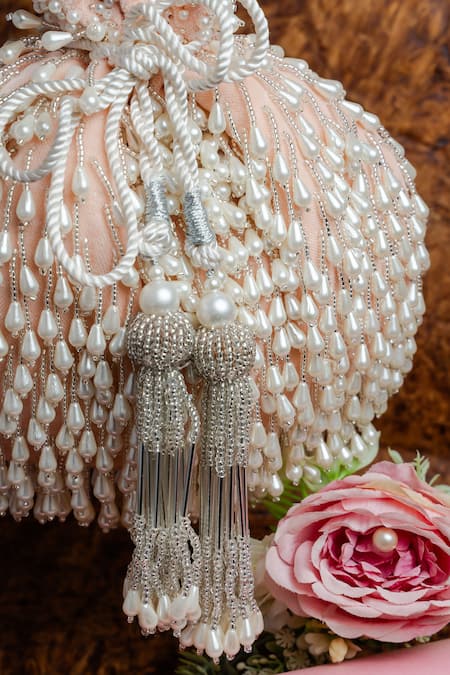 Shop Nayaab By Sonia Pink Pearls, Beads Tassel Blush Potli Bag Online at Aza Fashions Shop_Nayaab By Sonia_Pink Pearls, Beads Tassel Blush Potli Bag _Online_at_Aza_Fashions