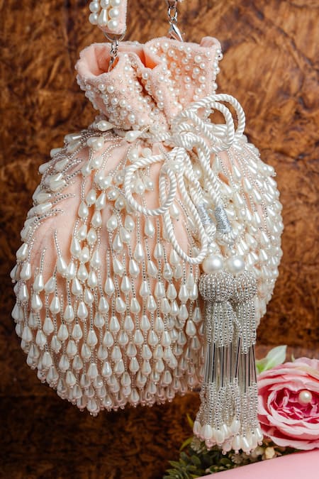 Nayaab By Sonia Pink Pearls, Beads Tassel Blush Potli Bag at Aza Fashions Nayaab By Sonia_Pink Pearls, Beads Tassel Blush Potli Bag _at_Aza_Fashions